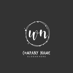 Handwritten initial letter W N WN for identity and logo. Vector logo template with handwriting and signature style.