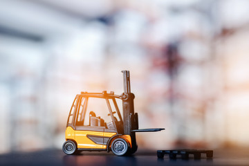 Forklift loader close up. Pallet stacker truck equipment at warehouse.