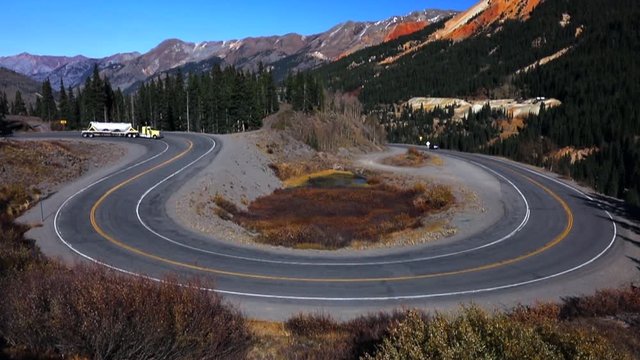 Circular elevated view of Colorado State Highway 550, known as "Million Dollar Highway" threads its way from Silverton to Ouray