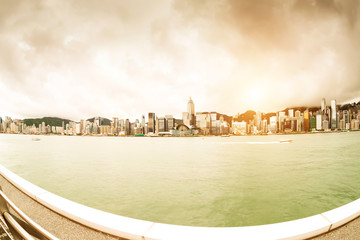 Fototapeta na wymiar Hong Kong's Victoria Harbour fog sunrise, modern Asian city.