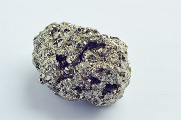 pyrite close up on white background
