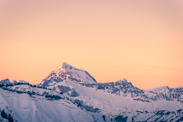 Mont Charvin (right) and the Aravis mountain range at sunrise or dawn, view from the top of Meg&egrave;ve, Haute-Savoie, France