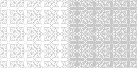 Compilation of gray and white floral patterns. Set of seamless backgrounds