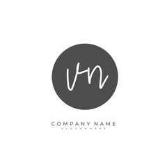 Handwritten initial letter V N VN for identity and logo. Vector logo template with handwriting and signature style.