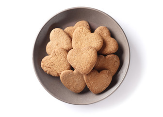 Cookies hearts on a plate isolated on white background