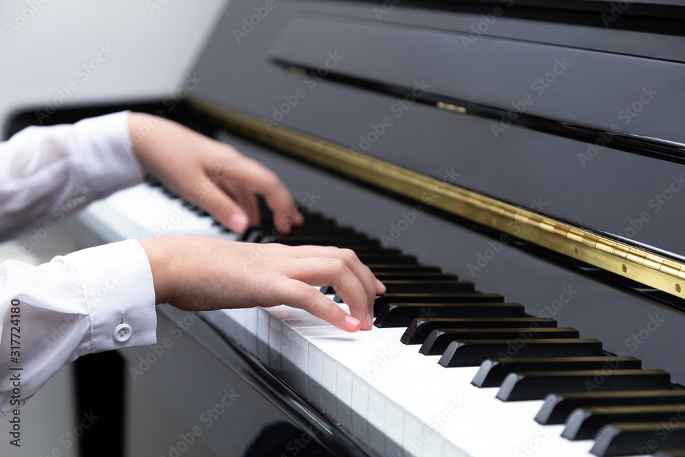 Wall mural hands playing piano