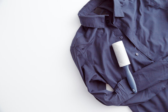 Dark Color Shirt With Static Cling, Covered By Dust, Lint, Fluff And Hairs And Sticky Roller To Clean Clothes.