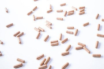 Supplements, a lot of pills on a white background. Vitamins and Health