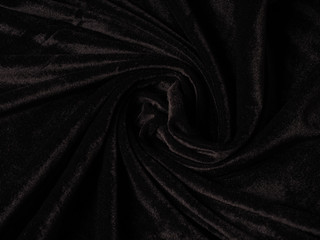 Closeup twisted coiled spiral black velvet background texture