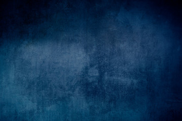 Fototapeta na wymiar Old blue grungy backdrop or texture