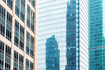 Modern glass silhouettes of skyscrapers in the city