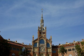 Fototapeta na wymiar Hospital Sant Pau. Barcelona Spain. 06. September. 2014. The hospital complex was built in 1901-1930. in the El Ginardo area. The ensemble of buildings of the Hospital of the Holy Cross and St. Paul