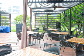Wooden table in the outdoor coffee room