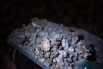 SMOG Ash from the stove on a spatula, an ecological problem