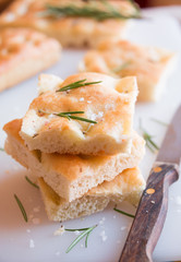 Simple plane pizza with rosemary and salt