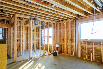 Interior with wood framing beam of new house under construction beam wood