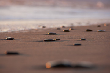 Marble Pebbles and Sunset (Carrara / La Spezia Beach)