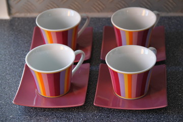 Four colorful porcelaine coffee cups