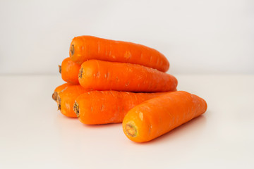 Carrots on a white background. 8 carrots