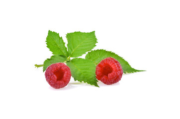 Raspberry with leaves isolated on white background.