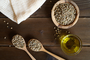 hemp seeds on a wooden background as a healthy food concept. flat lay.