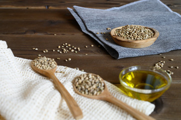 hemp seeds on a wooden background as a healthy food concept