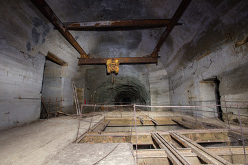 Underground gold mine tunnel with unfinished ore crusher room