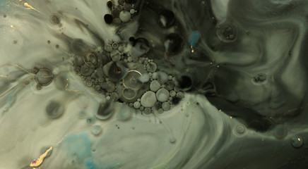 Abstract blot bubble background. Marble texture. Acrylic color in water and oil.