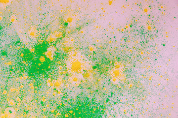yellow and green colorful holi paint explosion