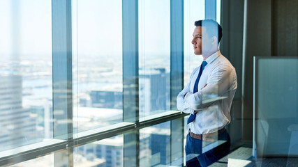 Contemplating corporate success high above the city