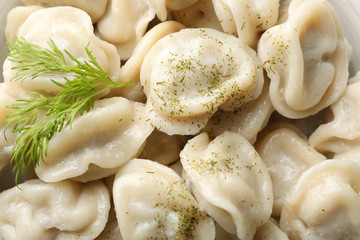 Dumplings with spices texture background, close up