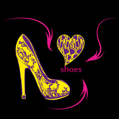 High heel yellow shoes with purple lace on black background
