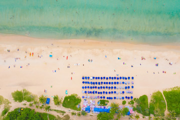 Aerial flying drone view of Kot Noi Beach white sandy beach on sunny tropical paradise island with aqua blue sky sea water ocean. Phuket © netsay