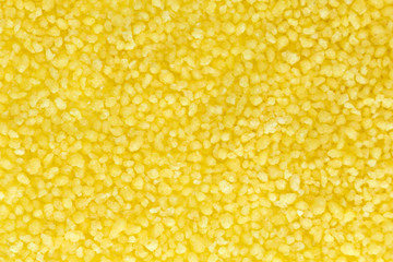 porridge kuskus couscous with bulgur. background texture. top view selective focus