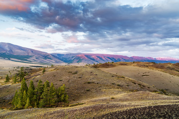 Hills lit by the setting sun. Kurai steppe, Altai Republic, Russia