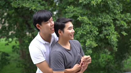 Asian gay couple happy outdoor