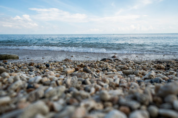 Close up of rounded and polished beach rocks. Pebble stones at the sea, Colorful Pebble Stones.