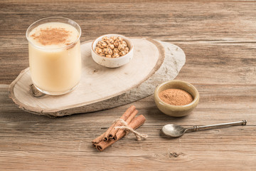 boza, fermented traditional Turkish beverage on a wooden table