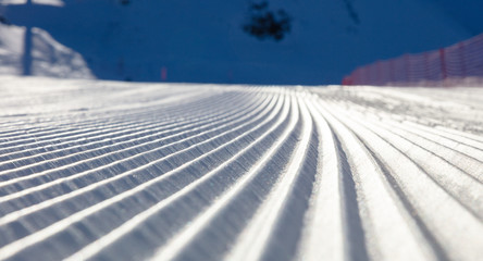 Corduroy texture snow at winter ski resort, Solden, Austria, Europe top of the ski slopes are...