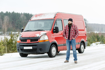 courier driver in the winter forest