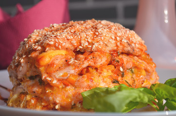 Thanksgiving, holiday, dinner. Cupcake casserole with chicken, carrots, onions and cheese on a wooden table. Food concept on a festive table.