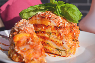 Thanksgiving, holiday, dinner. Cupcake casserole with chicken, carrots, onions and cheese on a wooden table. Food concept on a festive table.