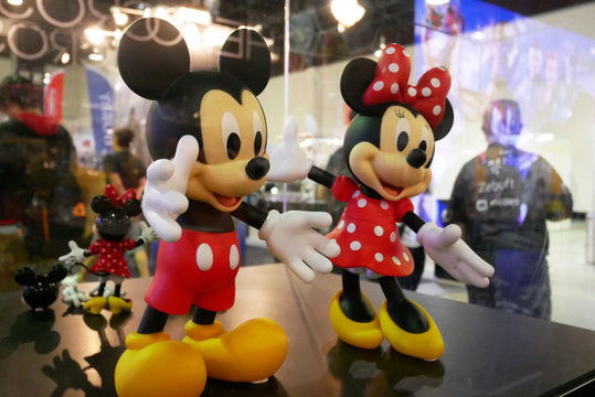 KUALA LUMPUR, MALAYSIA -JUNE 7, 2018: Fictional cartoon characters from Disney called Mickey & Minnie Mouse. Collector item of Mickey Mouse action figure display on a table. 