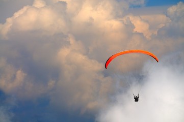 Skydiver flies over the mountains