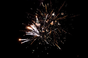 Fototapeta premium Golden fireworks on black background, Fireworks explode, fireworks background, light show, close-up