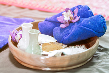Obraz na płótnie Canvas Blue towel And skin care equipment for the spa to be comfortable