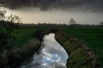 Fototapeta na wymiar farm landscape with river