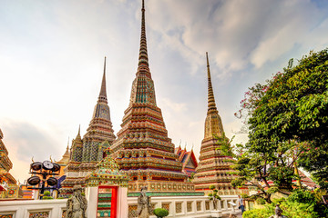 Fototapeta premium Reclining Buddha and surrounding structures at the Wat Pho Temple Complex in Bangkok