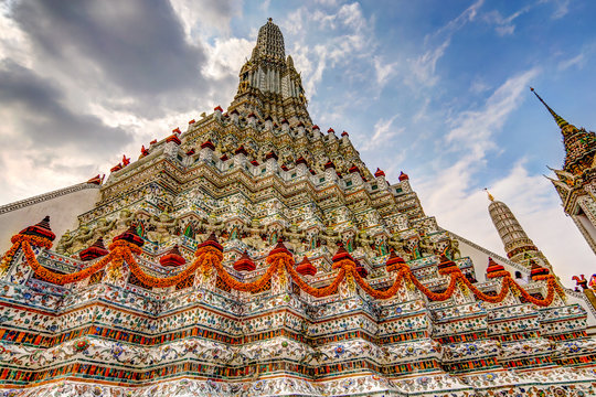 Sights and architectural details of the Temple of the Dawn in Bangkok.