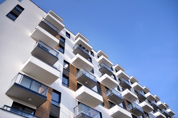 Modern and new apartment building. Multistoried, modern, new and stylish living block of flats.